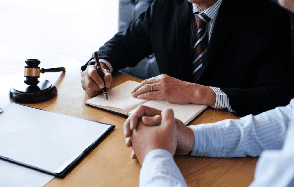 Granbury, Texas attorney reviewing estate planning and probate documents with a client during a legal consultation